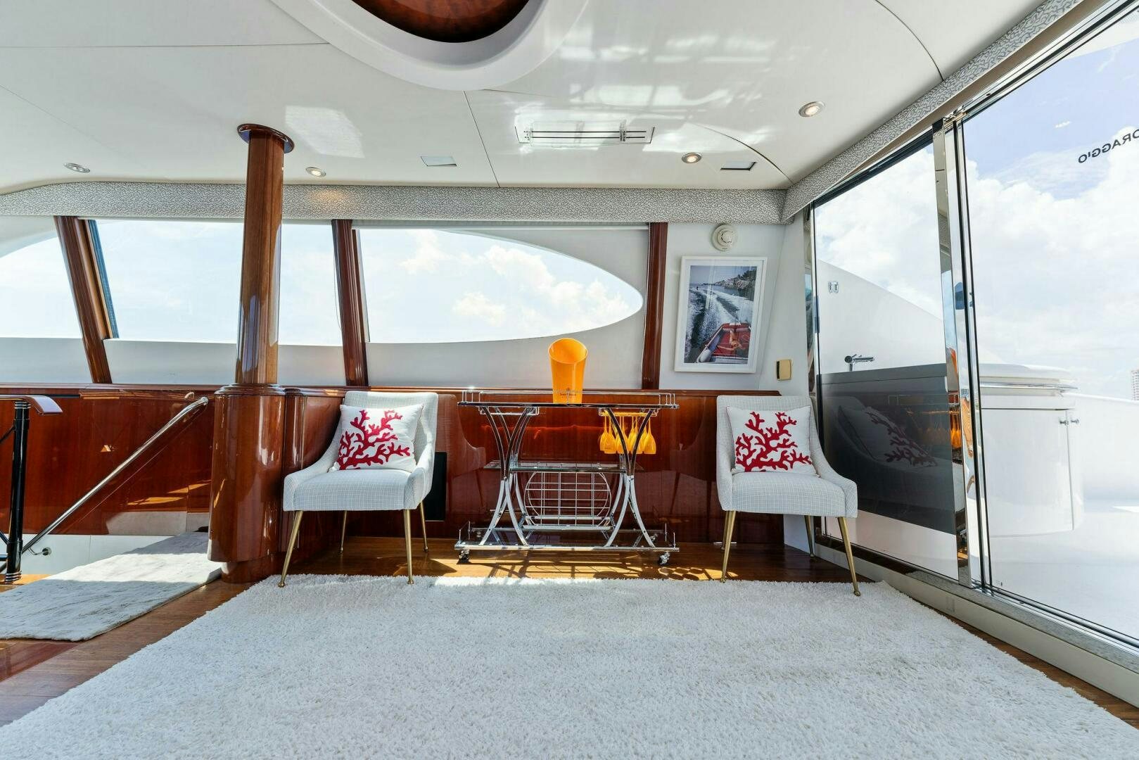 a room with chairs and tables aboard CORAGGIO Yacht for Sale