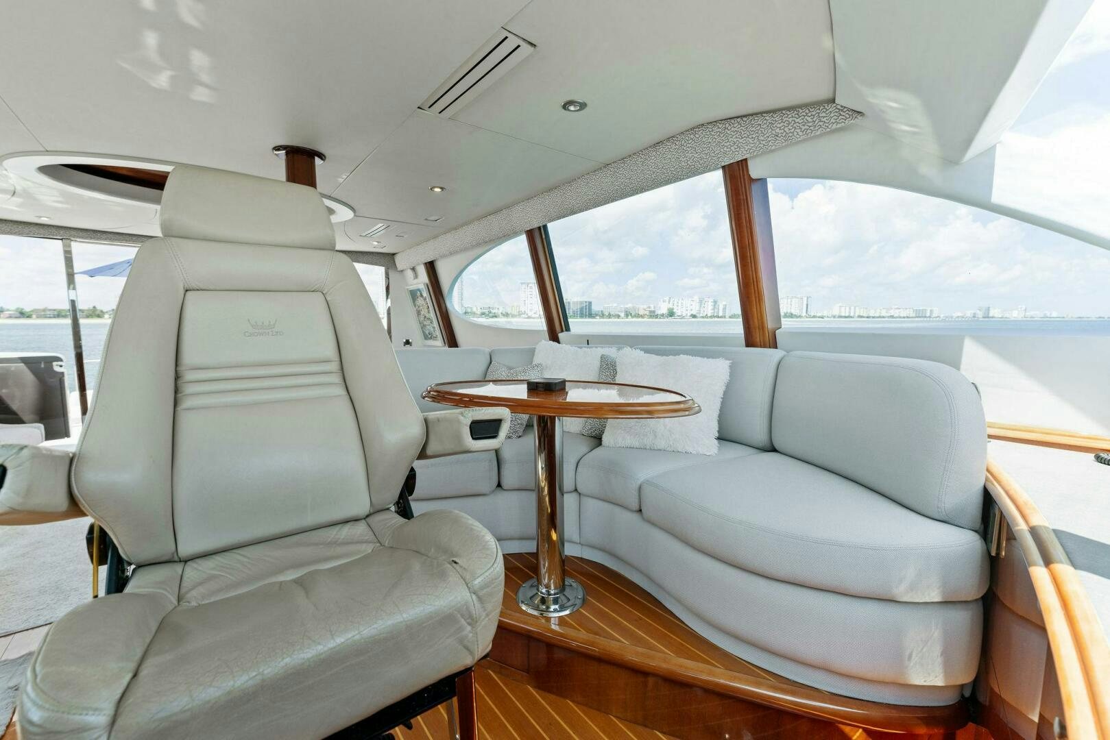 a boat with a table and chairs aboard CORAGGIO Yacht for Sale