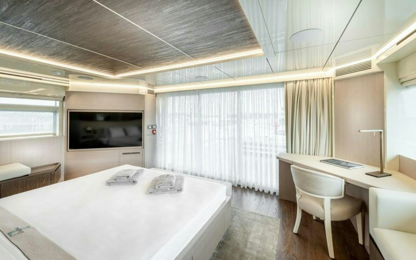 a room with a table and chairs aboard NUMARINE 32XP HULL 6 Yacht for Sale