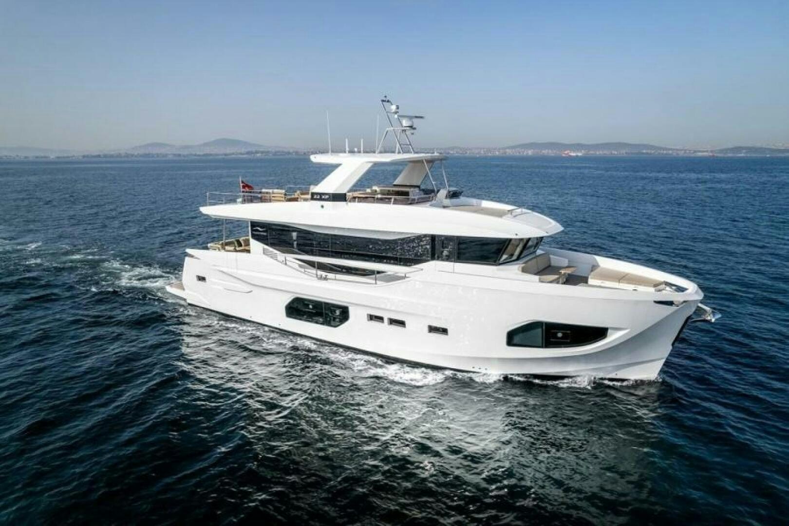 a white yacht in the water aboard NUMARINE 22XP HULL 7 Yacht for Sale