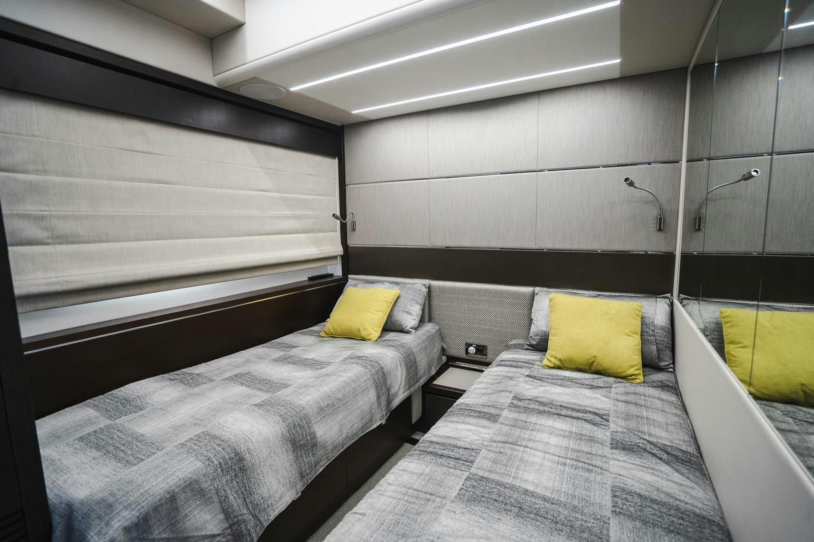 a couple of beds in a room aboard INCENTIVIZED Yacht for Sale