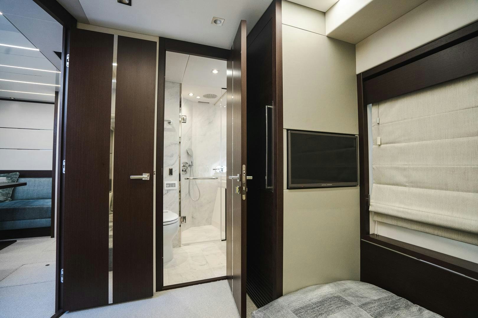 a room with a glass door aboard INCENTIVIZED Yacht for Sale