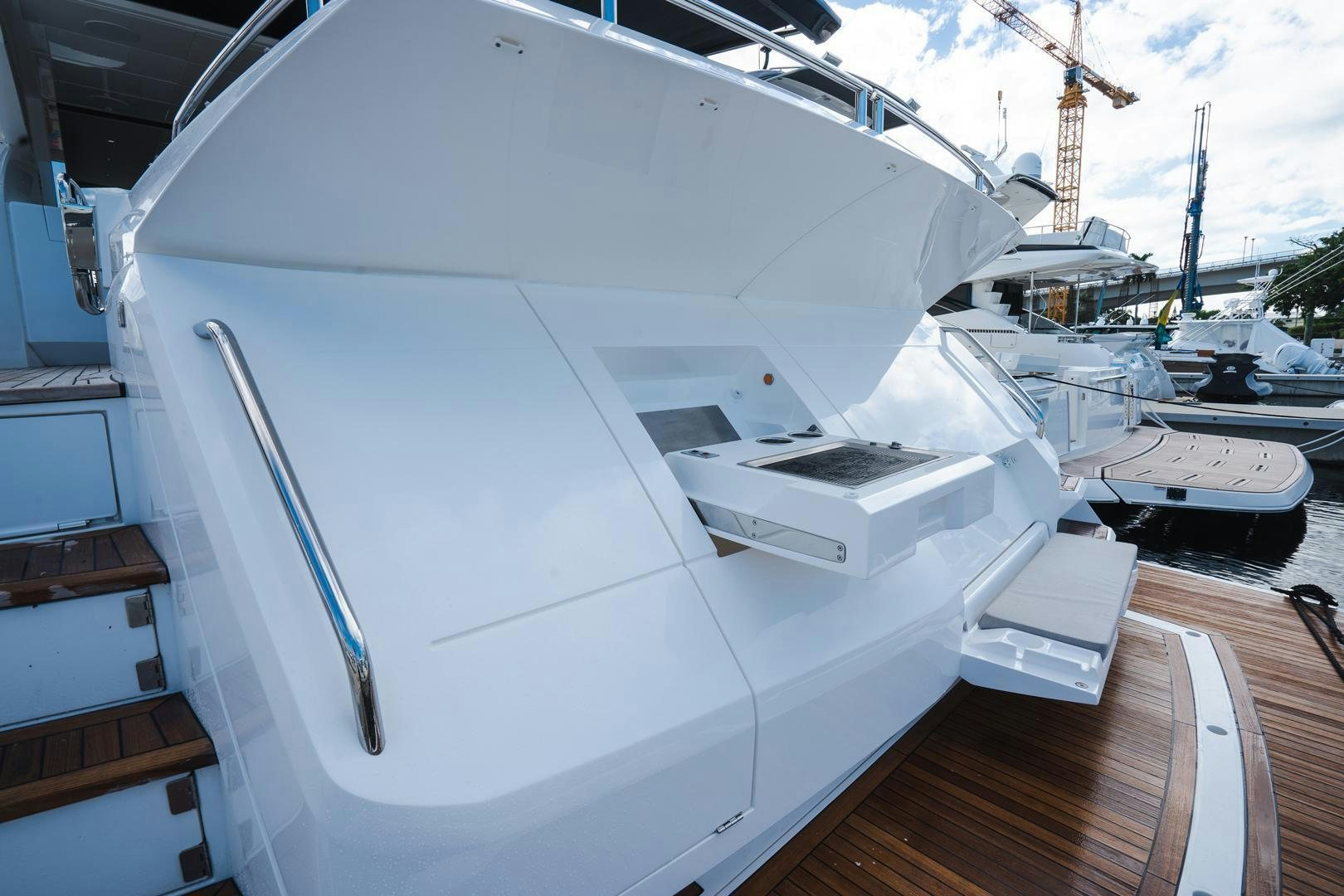 a white boat on a deck aboard INCENTIVIZED Yacht for Sale