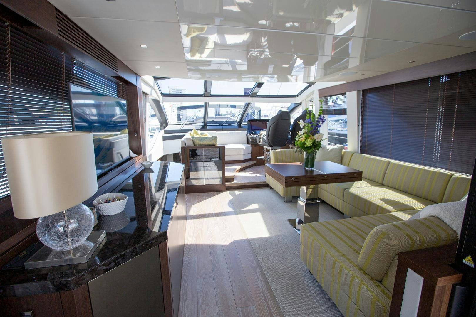 a room with a table and chairs aboard INCENTIVIZED Yacht for Sale