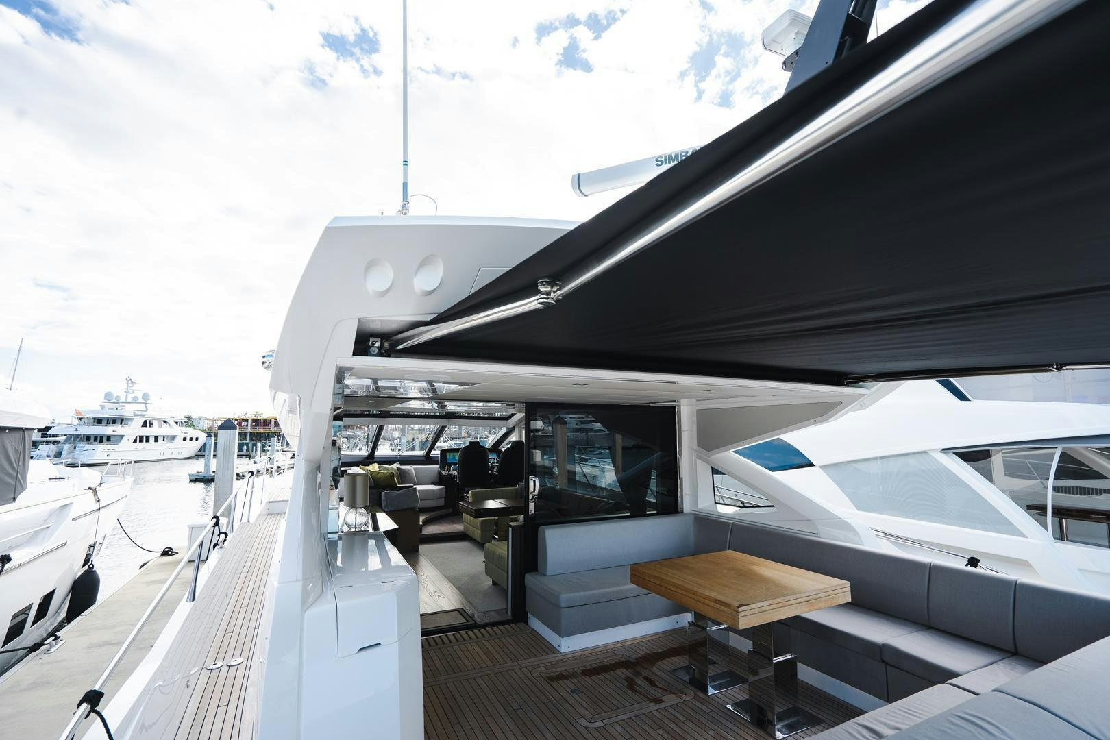 a boat docked at a pier aboard INCENTIVIZED Yacht for Sale