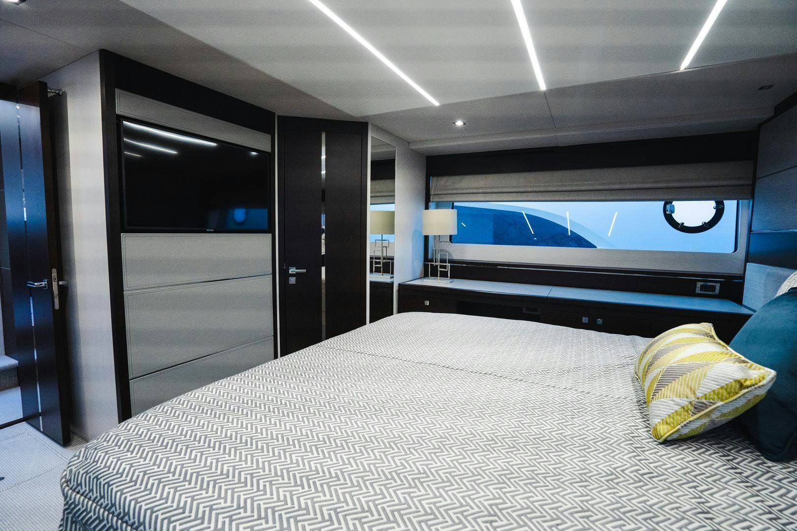 a large bedroom with a large bed aboard INCENTIVIZED Yacht for Sale