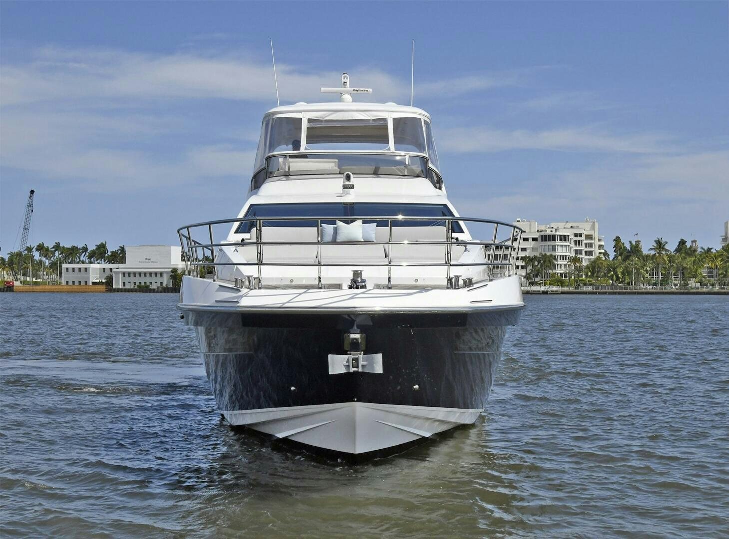 a large white boat in the water aboard SLAINTE Yacht for Sale