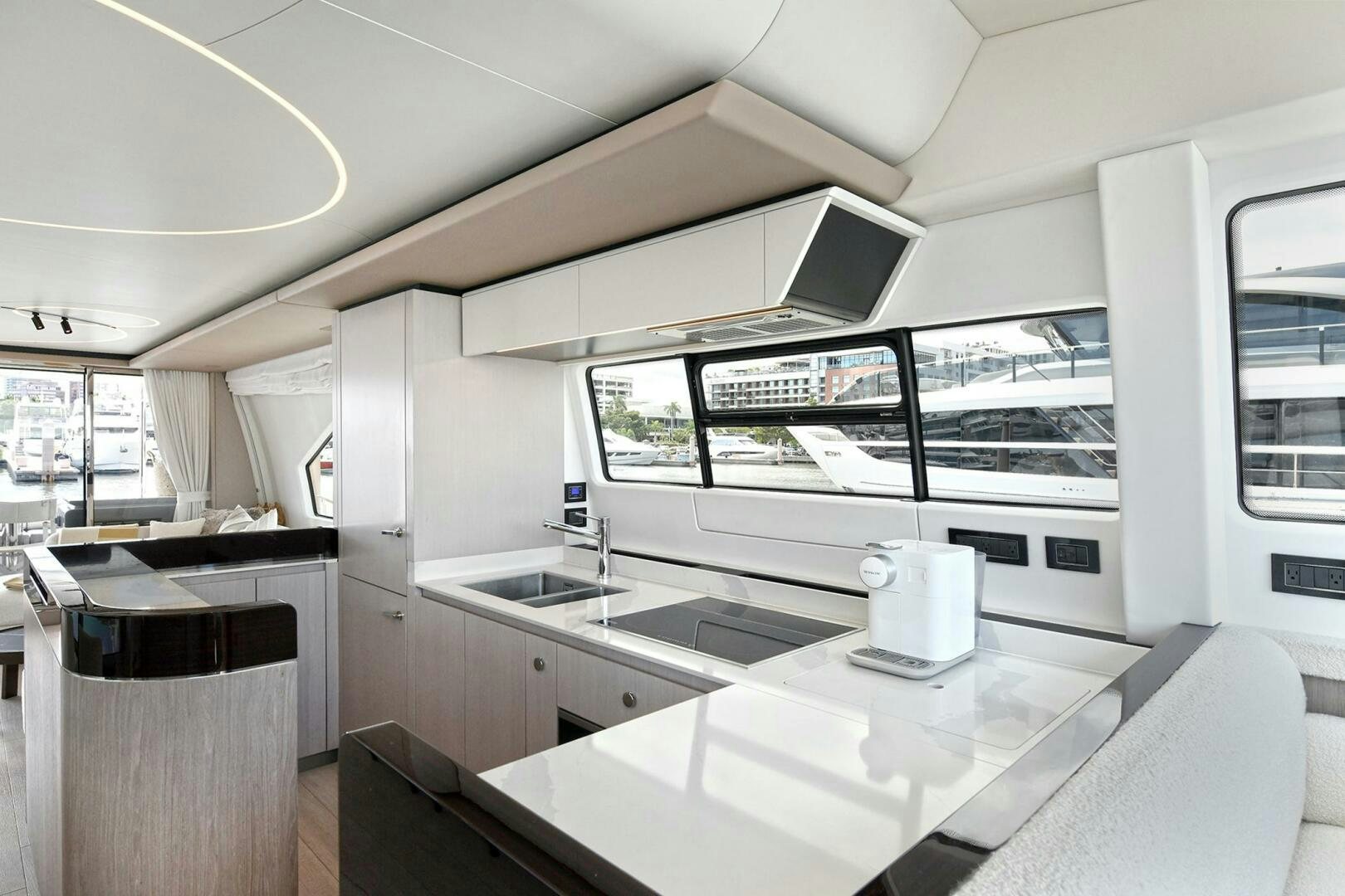 a kitchen with a large island aboard SLAINTE Yacht for Sale