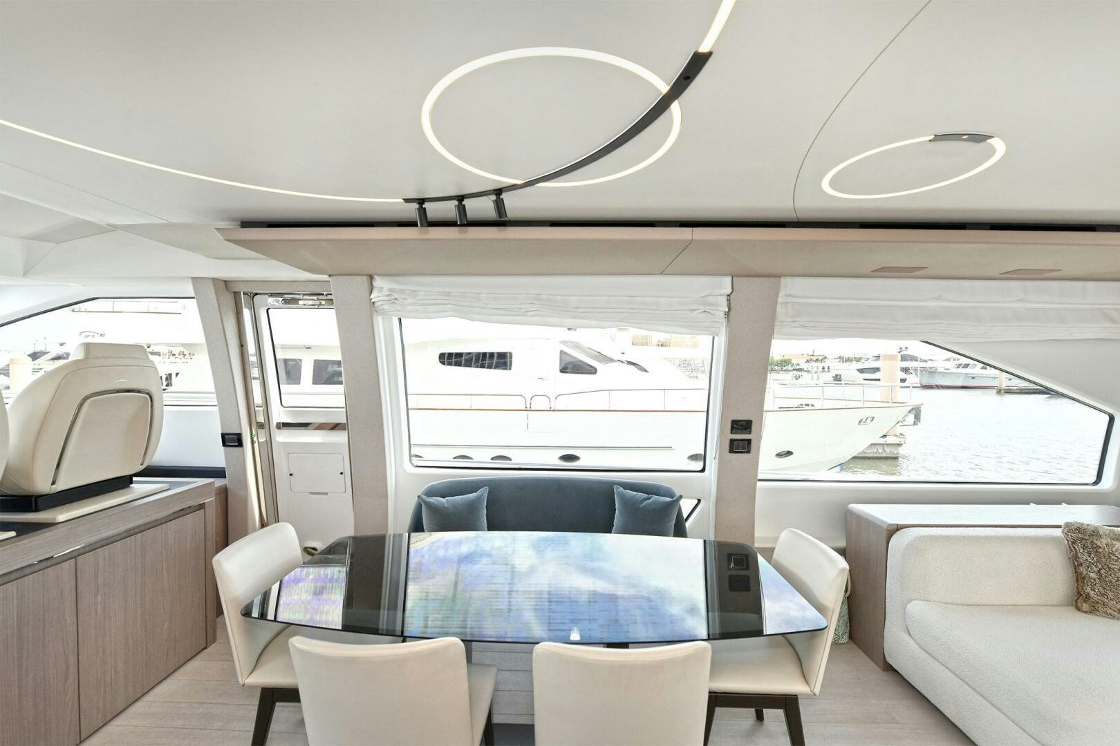 inside of a vehicle with a large window and a white ceiling aboard SLAINTE Yacht for Sale