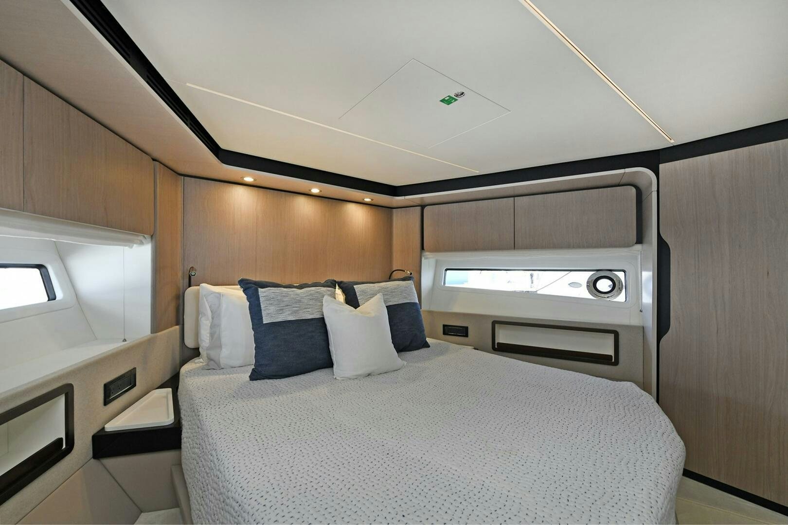 a bed in a room aboard SLAINTE Yacht for Sale