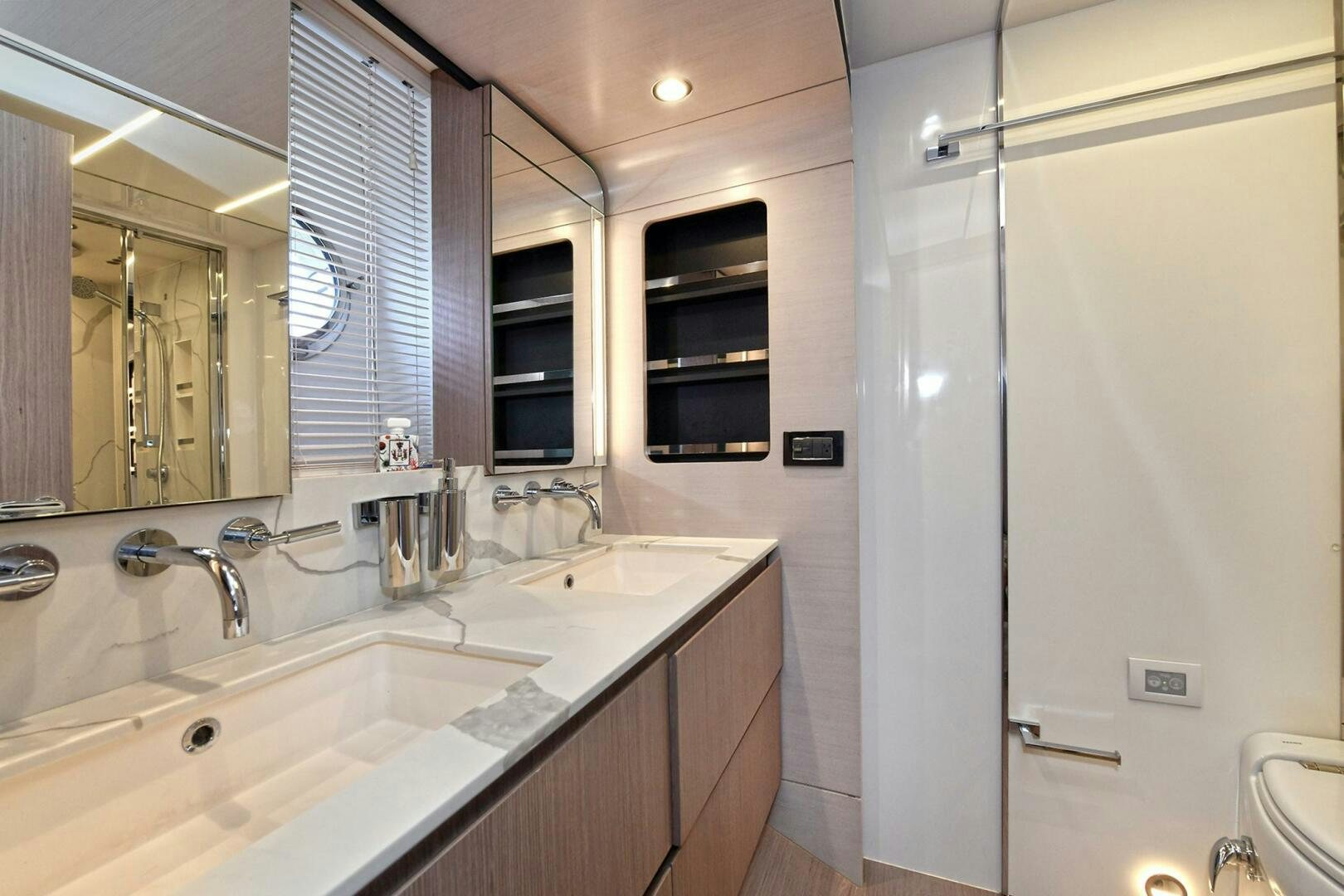 a bathroom with two sinks aboard SLAINTE Yacht for Sale