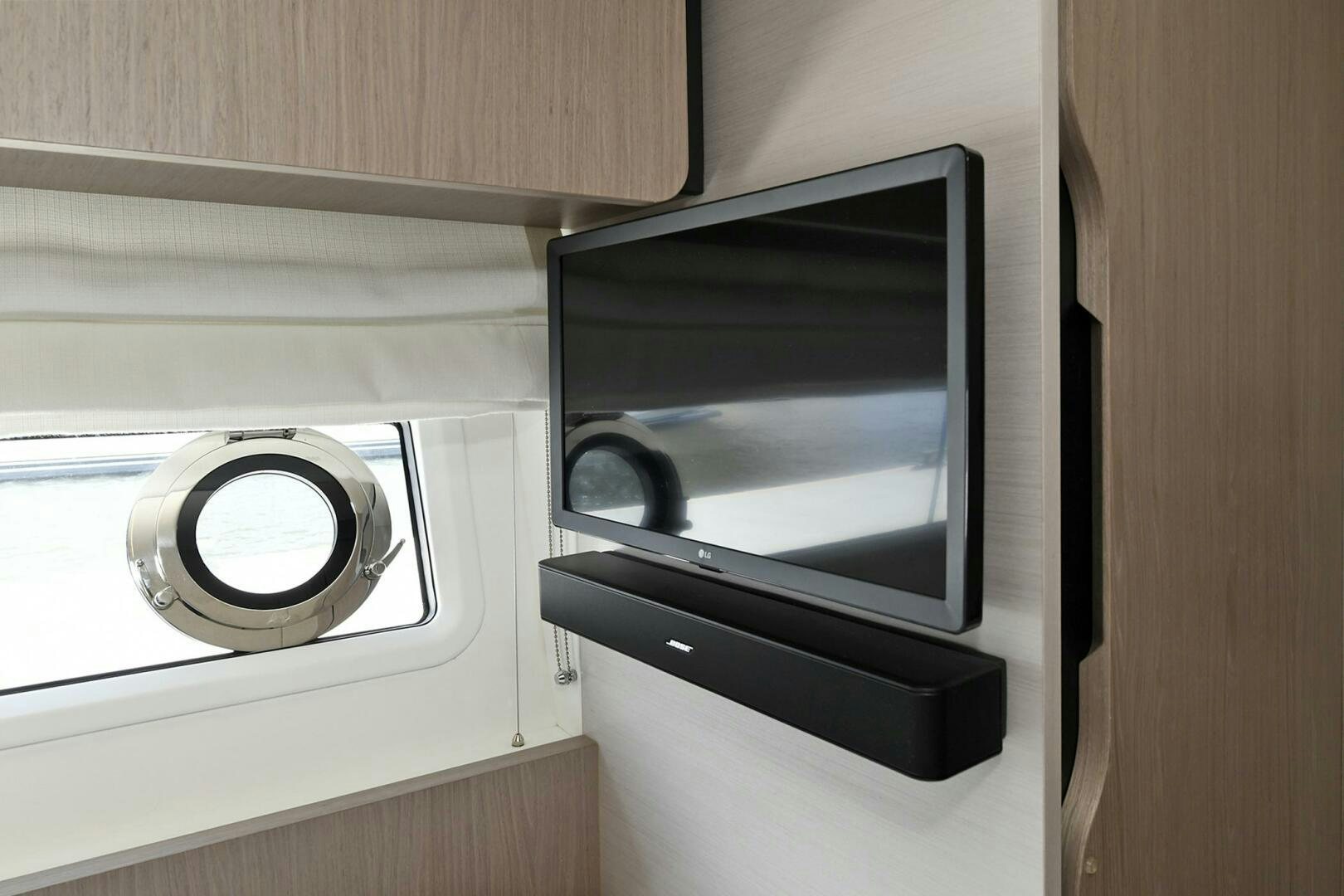 a tv on a shelf aboard SLAINTE Yacht for Sale
