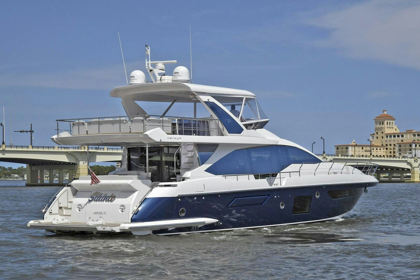 a large white boat in the water aboard SLAINTE Yacht for Sale