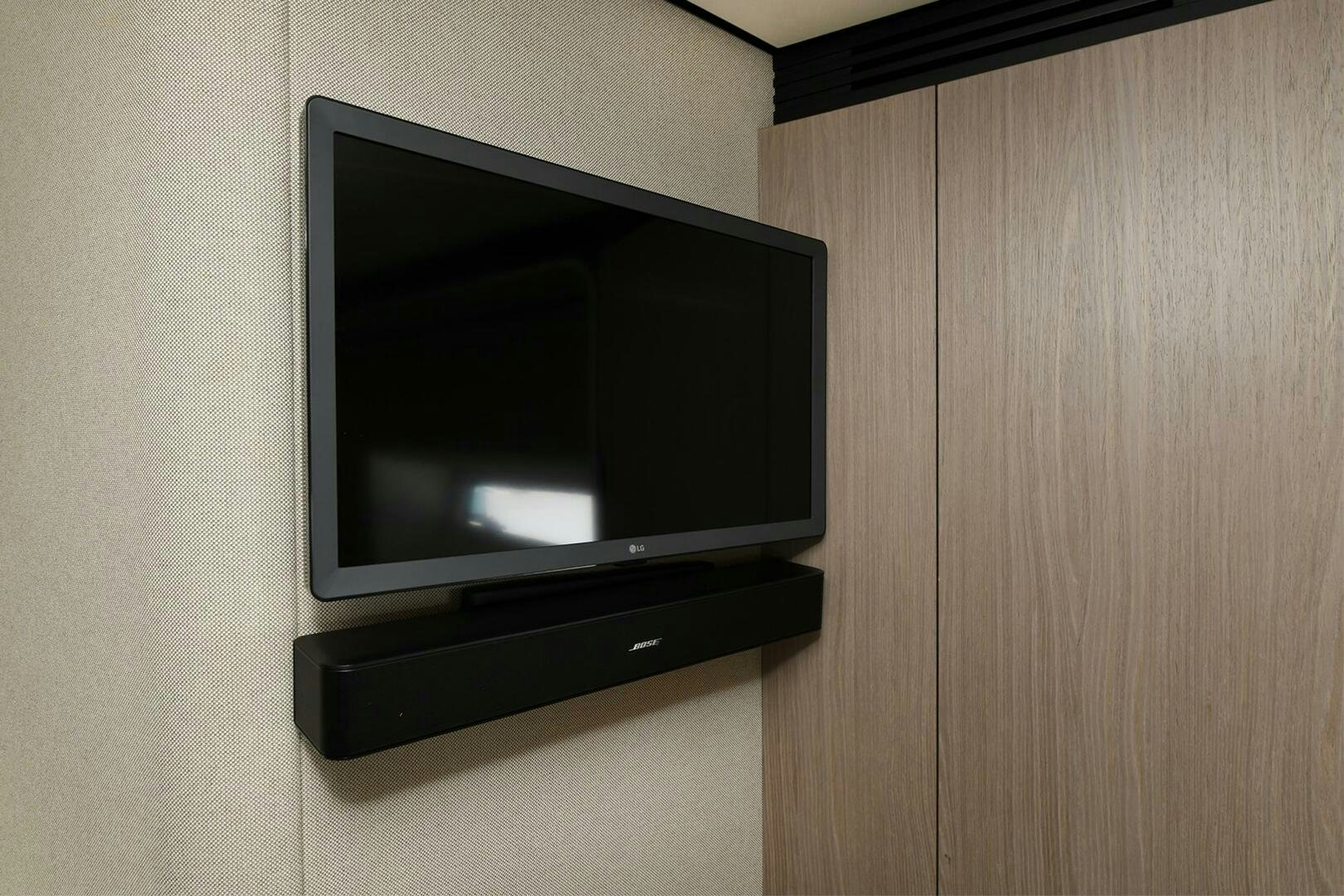 a tv on a wall aboard SLAINTE Yacht for Sale
