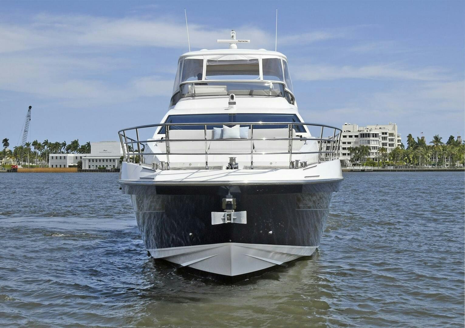 a large white boat in the water aboard SLAINTE Yacht for Sale