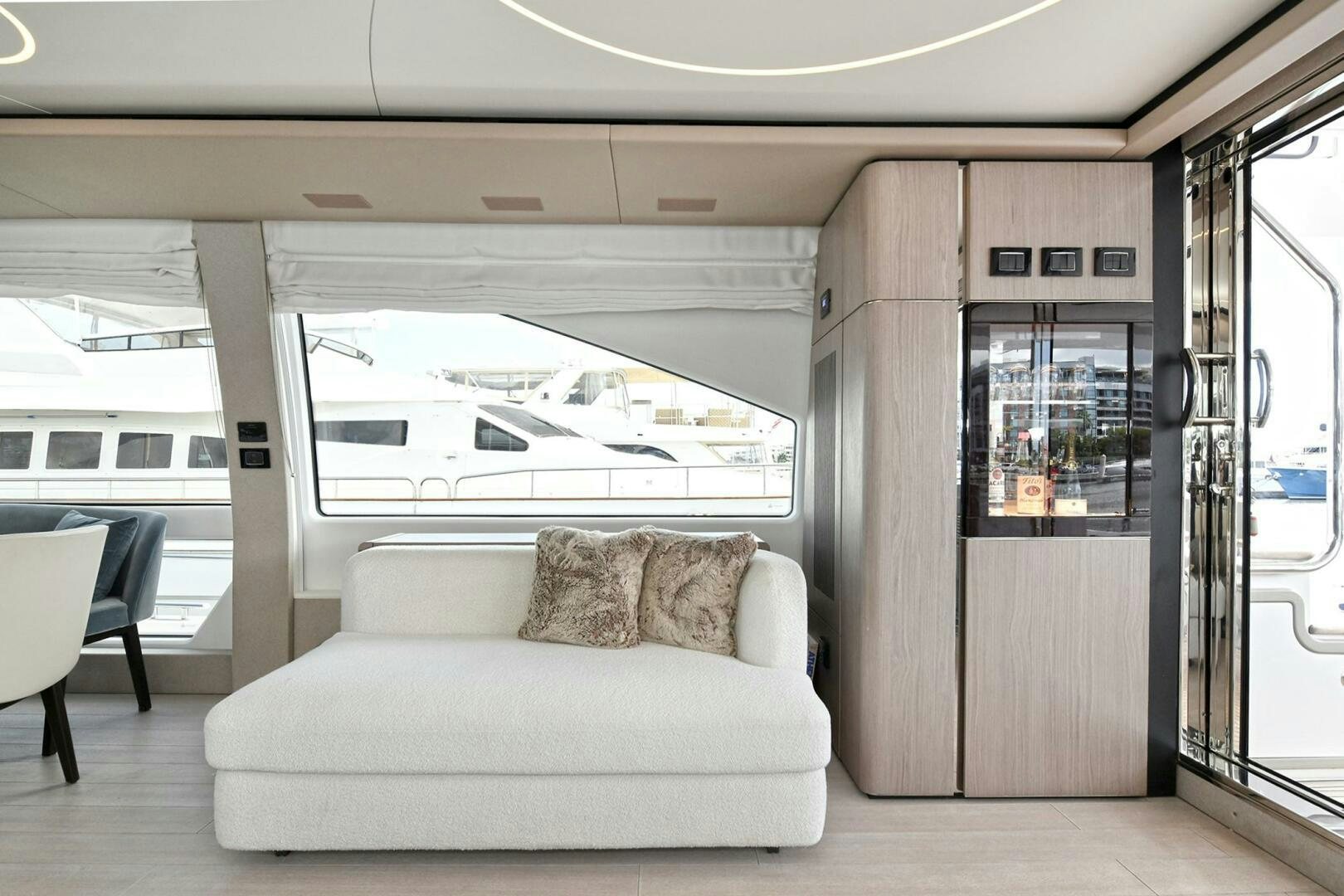 a couch in a train aboard SLAINTE Yacht for Sale