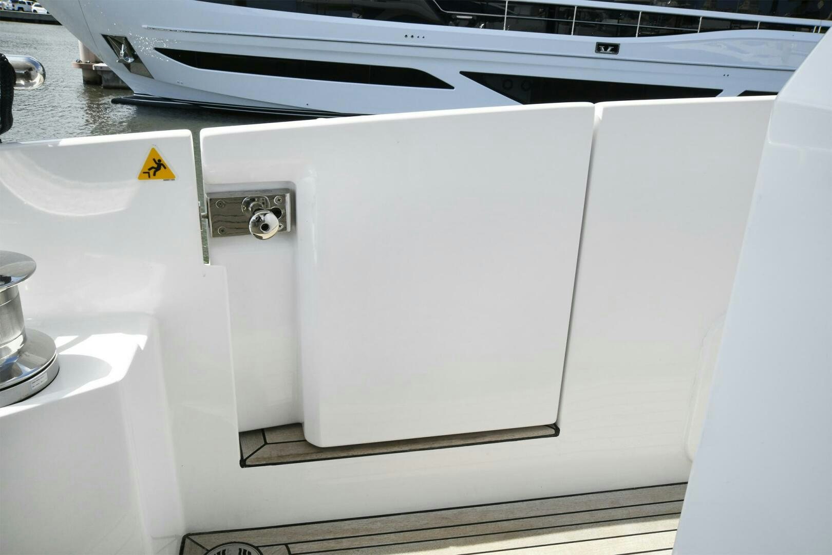 a white rectangular object with a black cable on top aboard SLAINTE Yacht for Sale