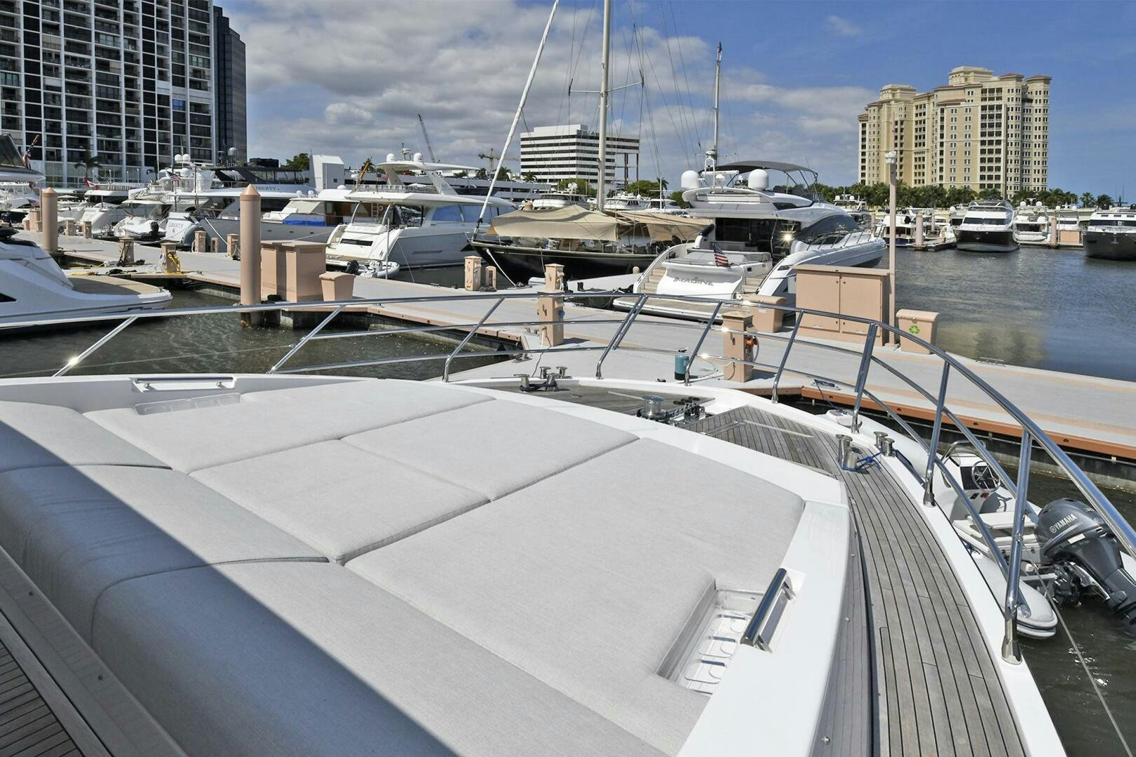 a boat docked at a pier aboard SLAINTE Yacht for Sale