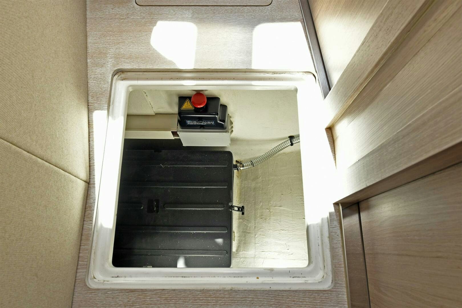 a small oven with a light on top aboard SLAINTE Yacht for Sale