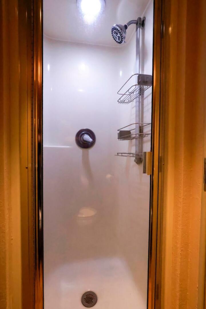 a shower with a shower head aboard NORTH COAST Yacht for Sale