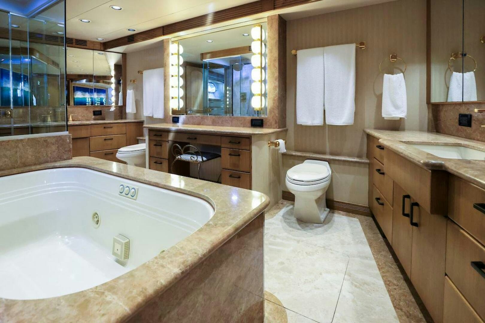 a bathroom with a large bathtub aboard NORTH COAST Yacht for Sale