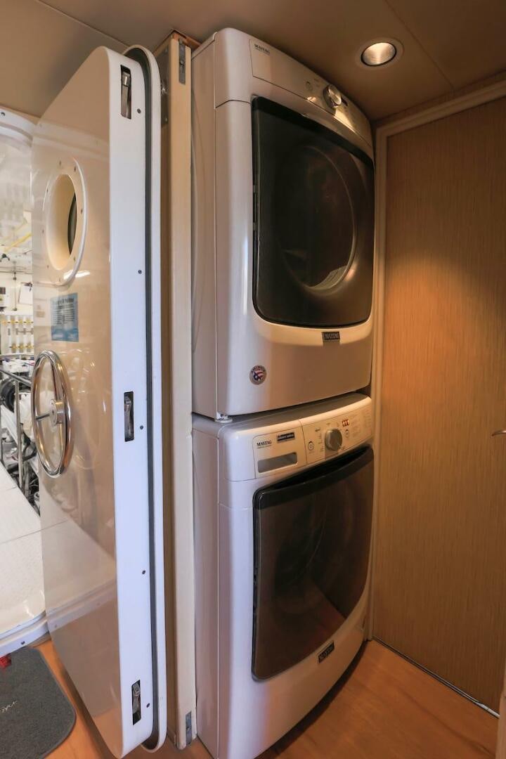 a row of washers in a room aboard NORTH COAST Yacht for Sale