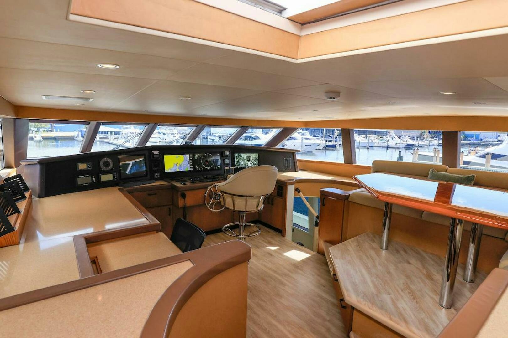 inside of a building with tables and chairs aboard NORTH COAST Yacht for Sale