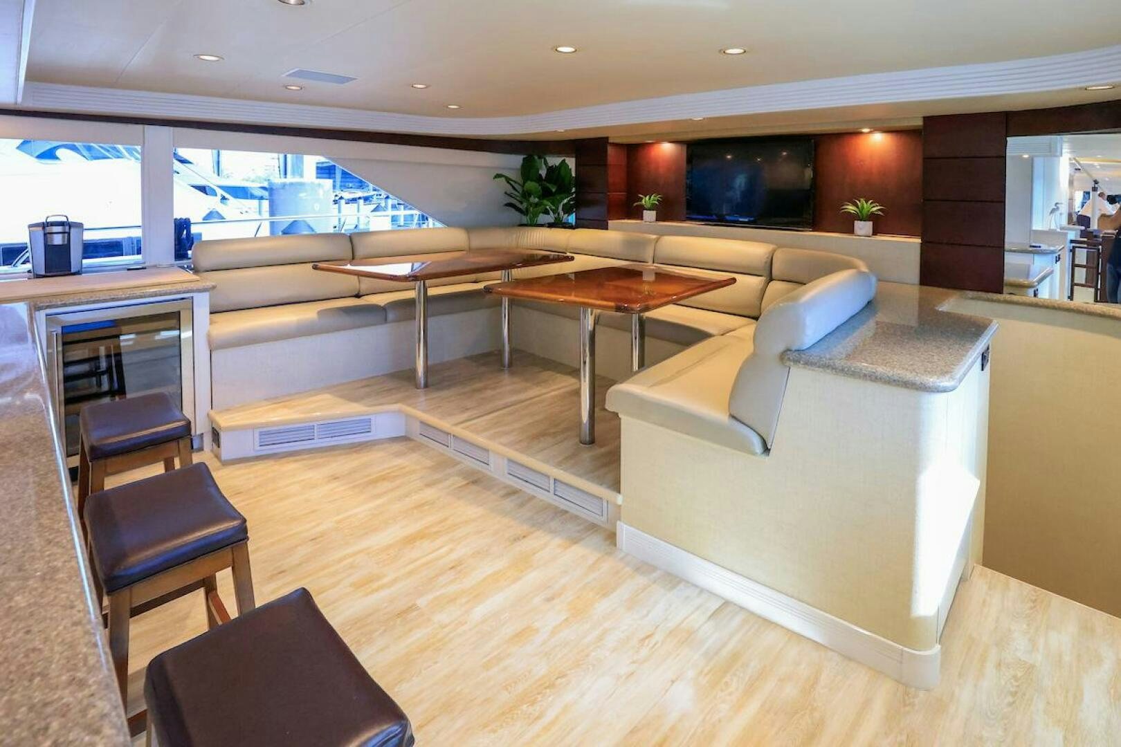 a living room with a couch and a table aboard NORTH COAST Yacht for Sale