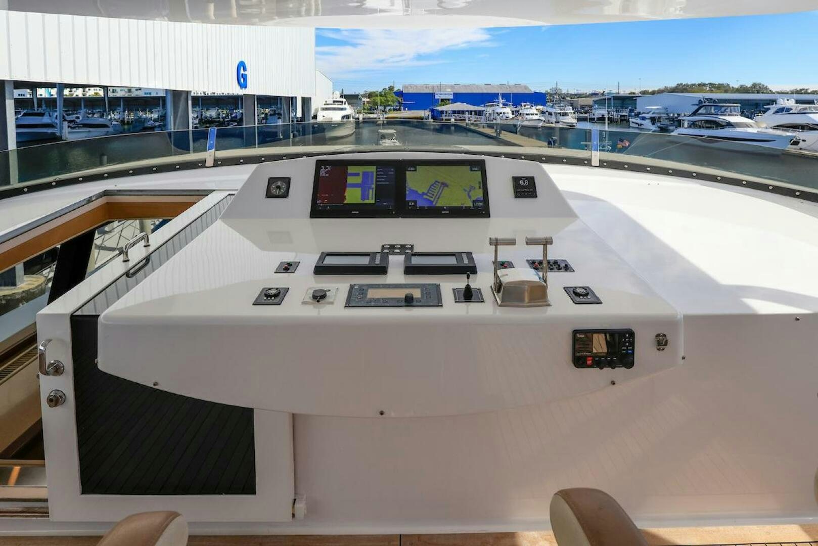 a white boat with a screen aboard NORTH COAST Yacht for Sale