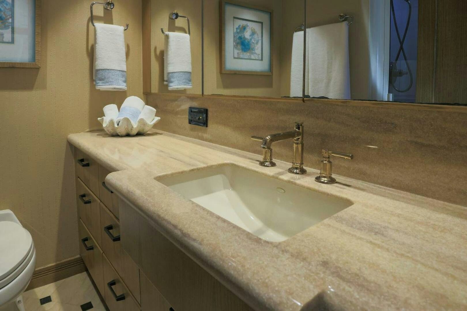 a bathroom with two sinks aboard NORTH COAST Yacht for Sale
