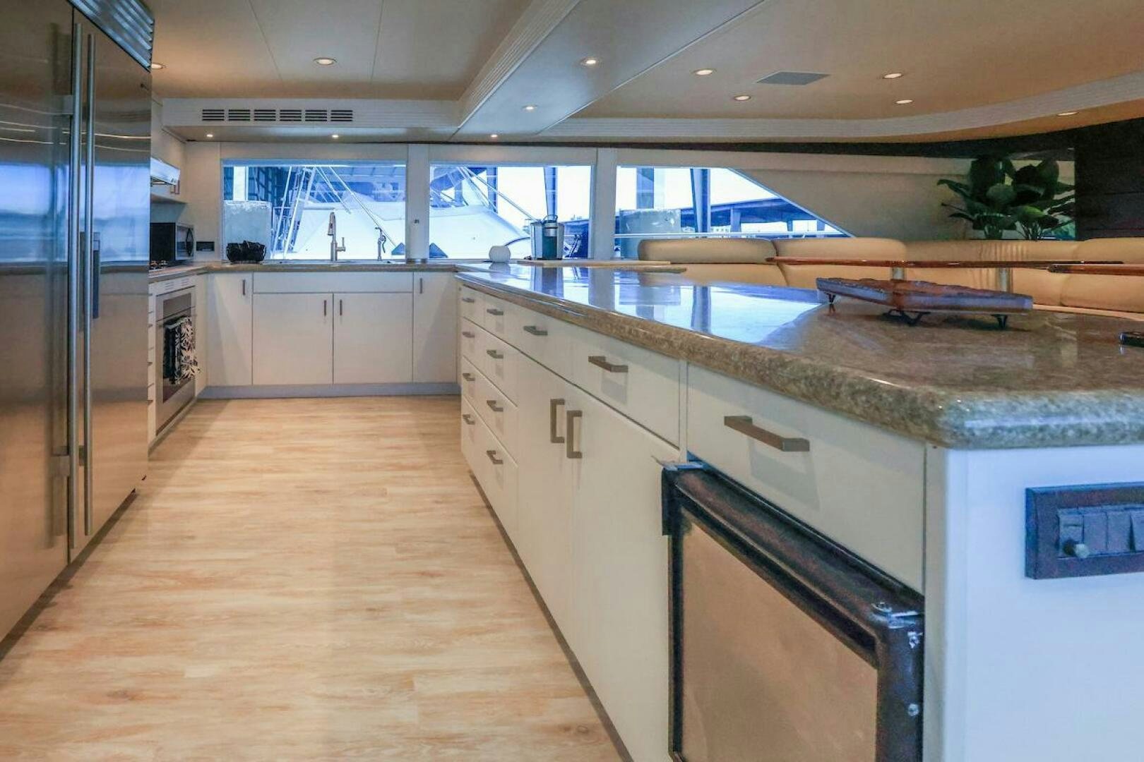 a kitchen with a large island aboard NORTH COAST Yacht for Sale