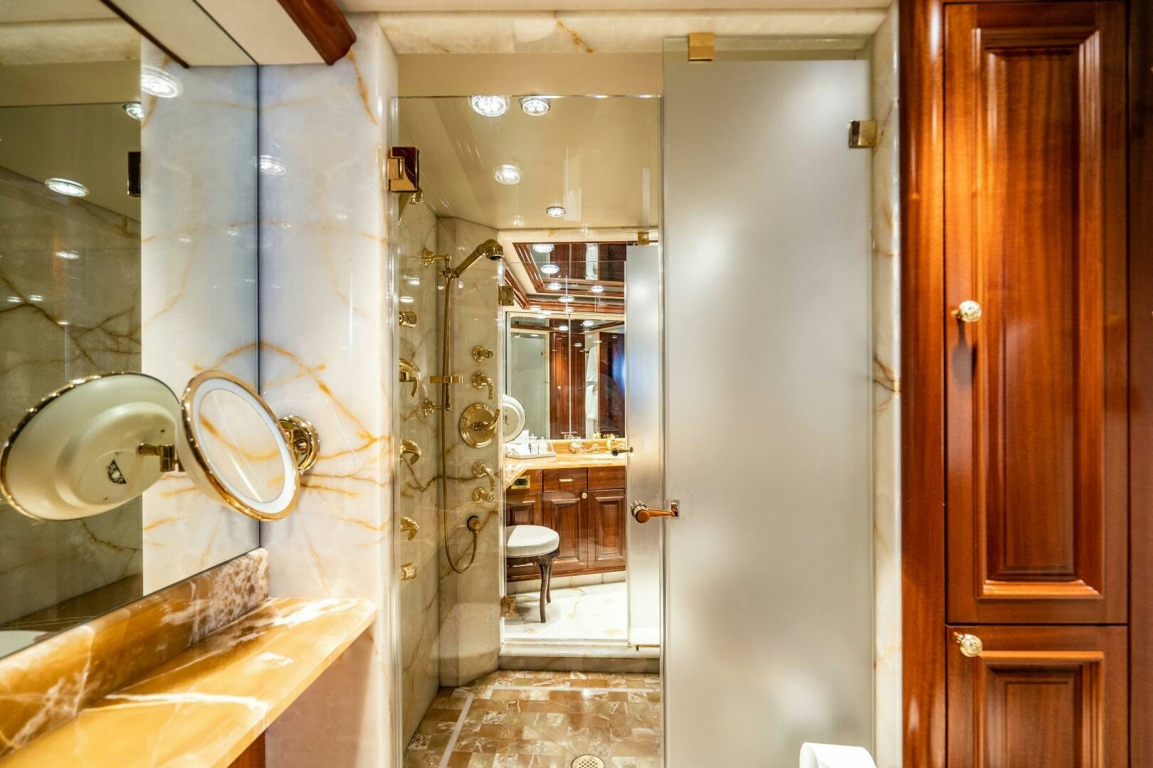 a bathroom with a marble counter aboard FIRST LIGHT Yacht for Sale
