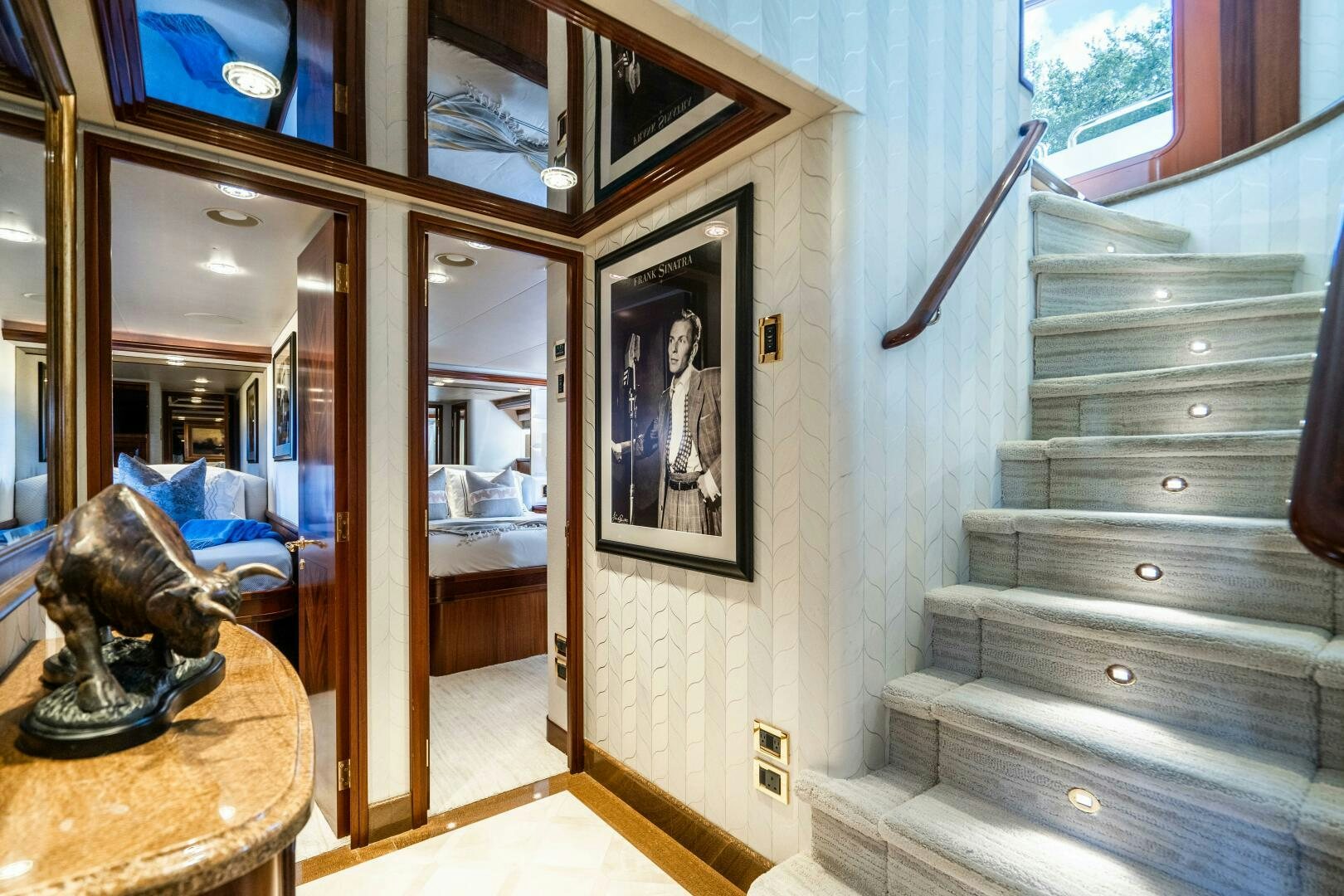 a room with a mirror and a bed aboard FIRST LIGHT Yacht for Sale