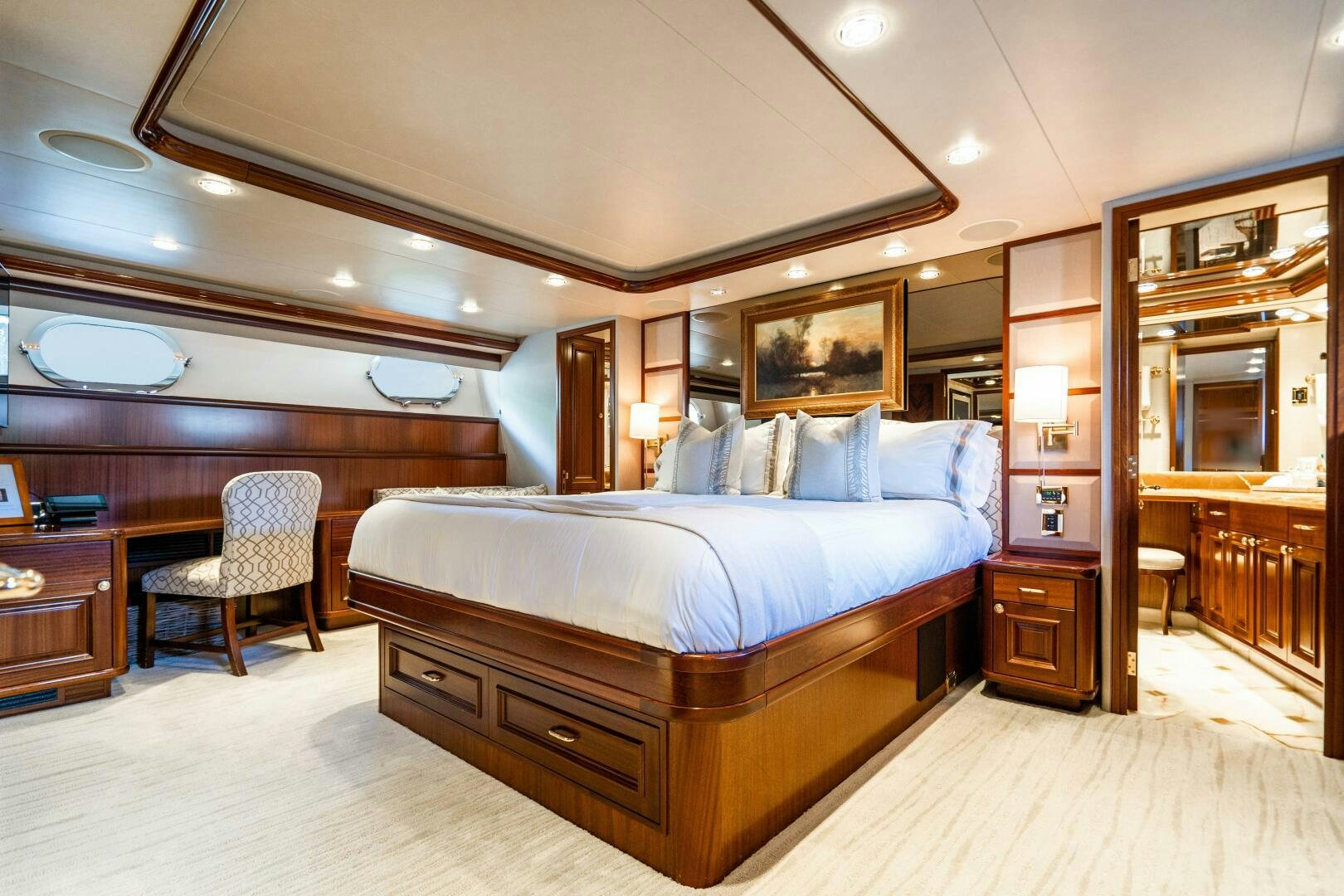 a large bedroom with a large bed aboard FIRST LIGHT Yacht for Sale
