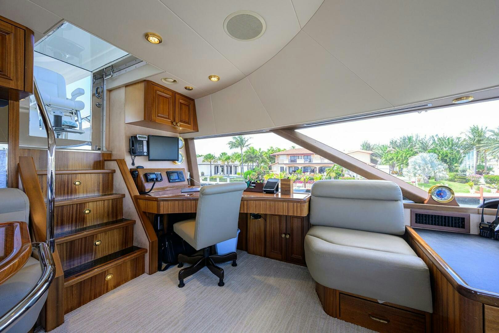 a living room with a large window aboard FIRST LIGHT Yacht for Sale