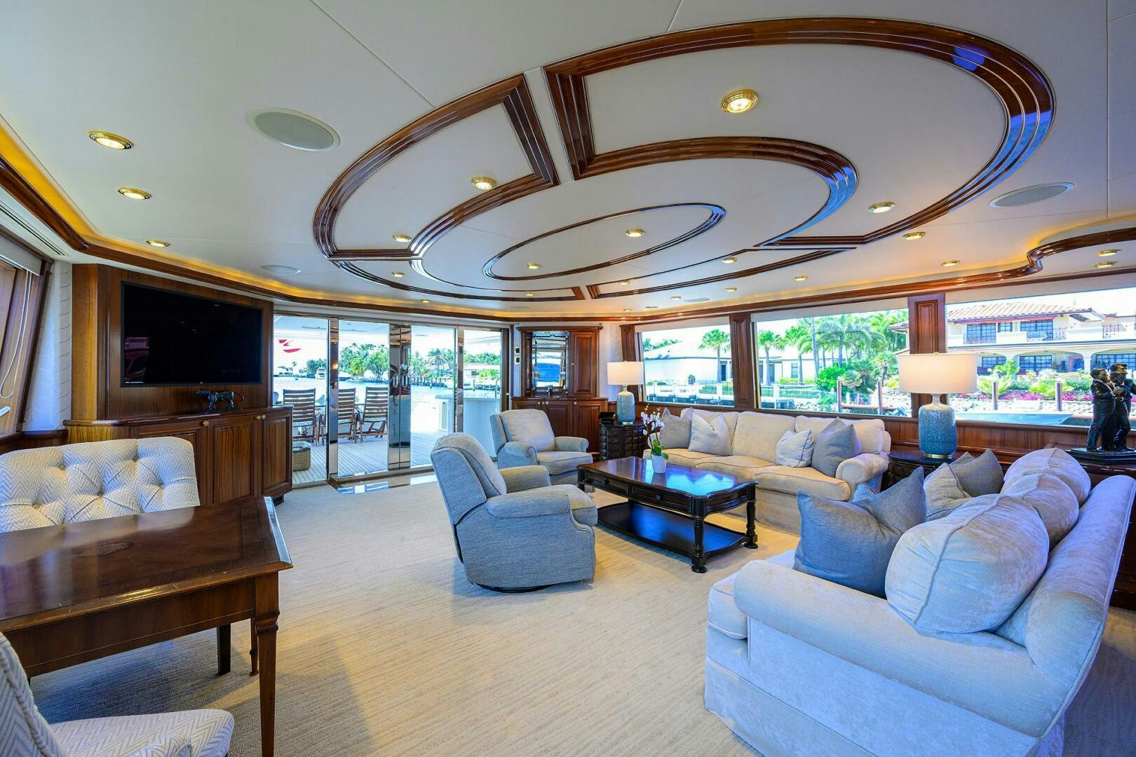a living room with a large glass ceiling aboard FIRST LIGHT Yacht for Sale