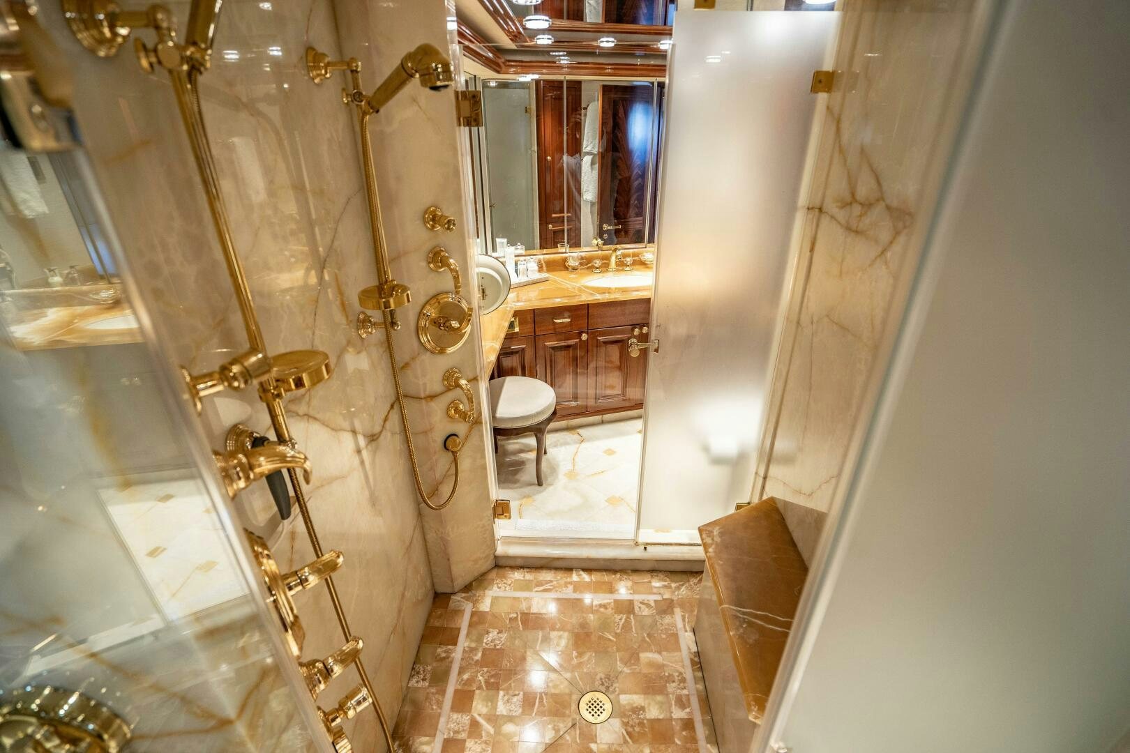 a bathroom with a glass shower aboard FIRST LIGHT Yacht for Sale