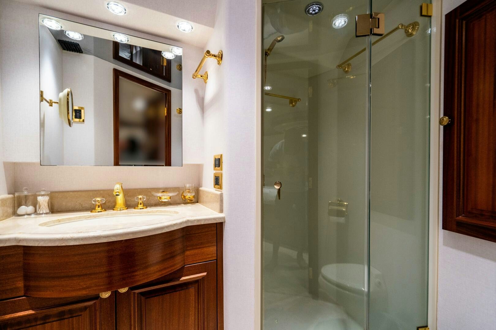 a bathroom with a large mirror aboard FIRST LIGHT Yacht for Sale