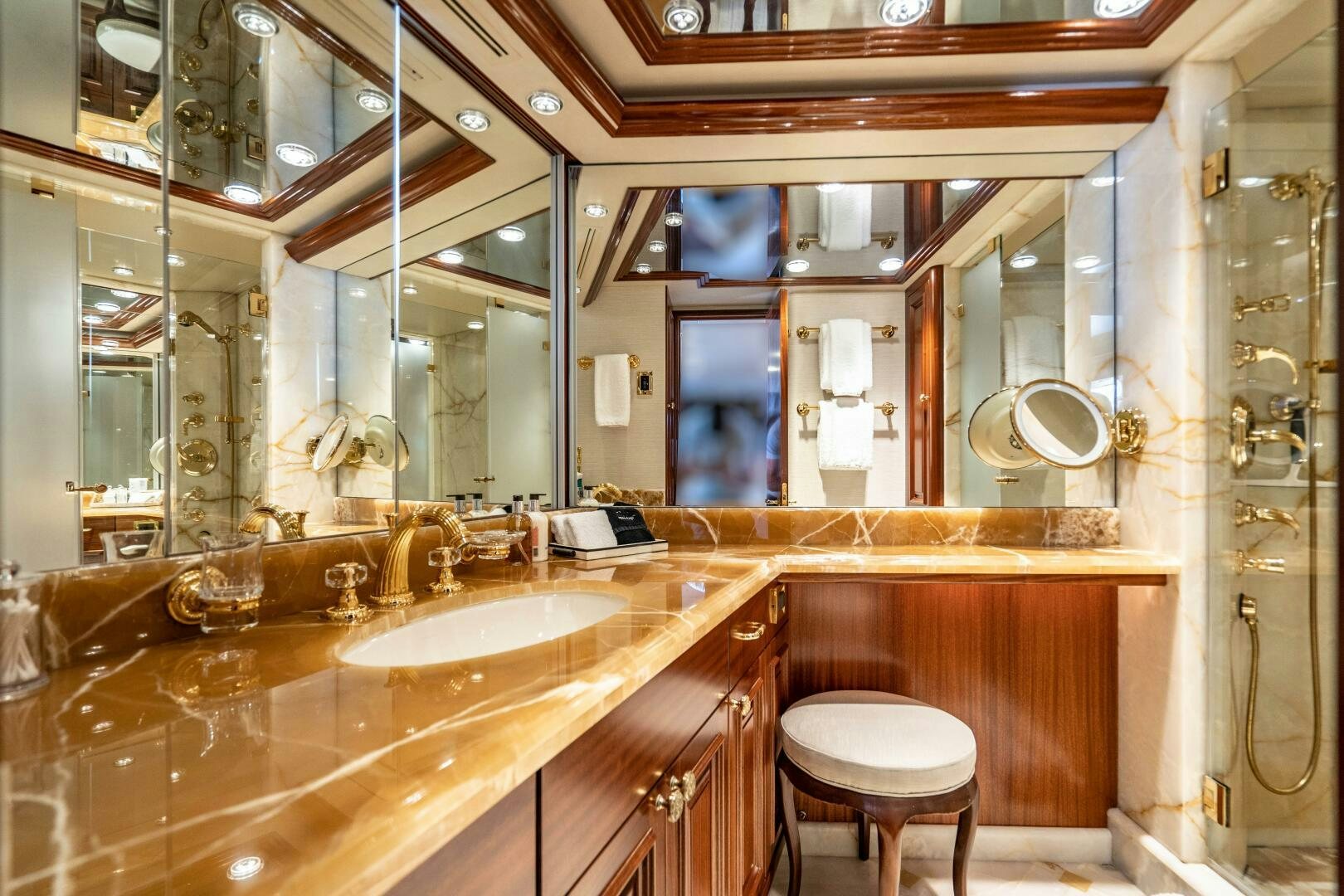a bathroom with a large mirror aboard FIRST LIGHT Yacht for Sale