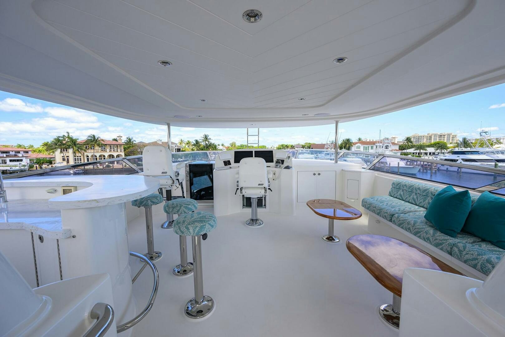 a room with a view of the city and the water aboard FIRST LIGHT Yacht for Sale