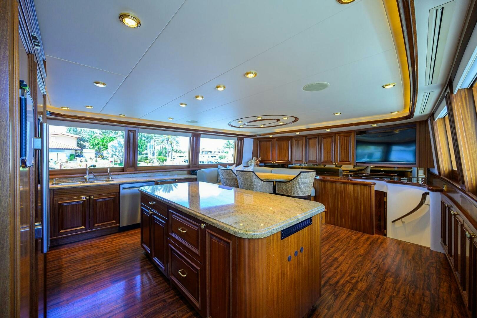 a kitchen with wooden cabinets aboard FIRST LIGHT Yacht for Sale
