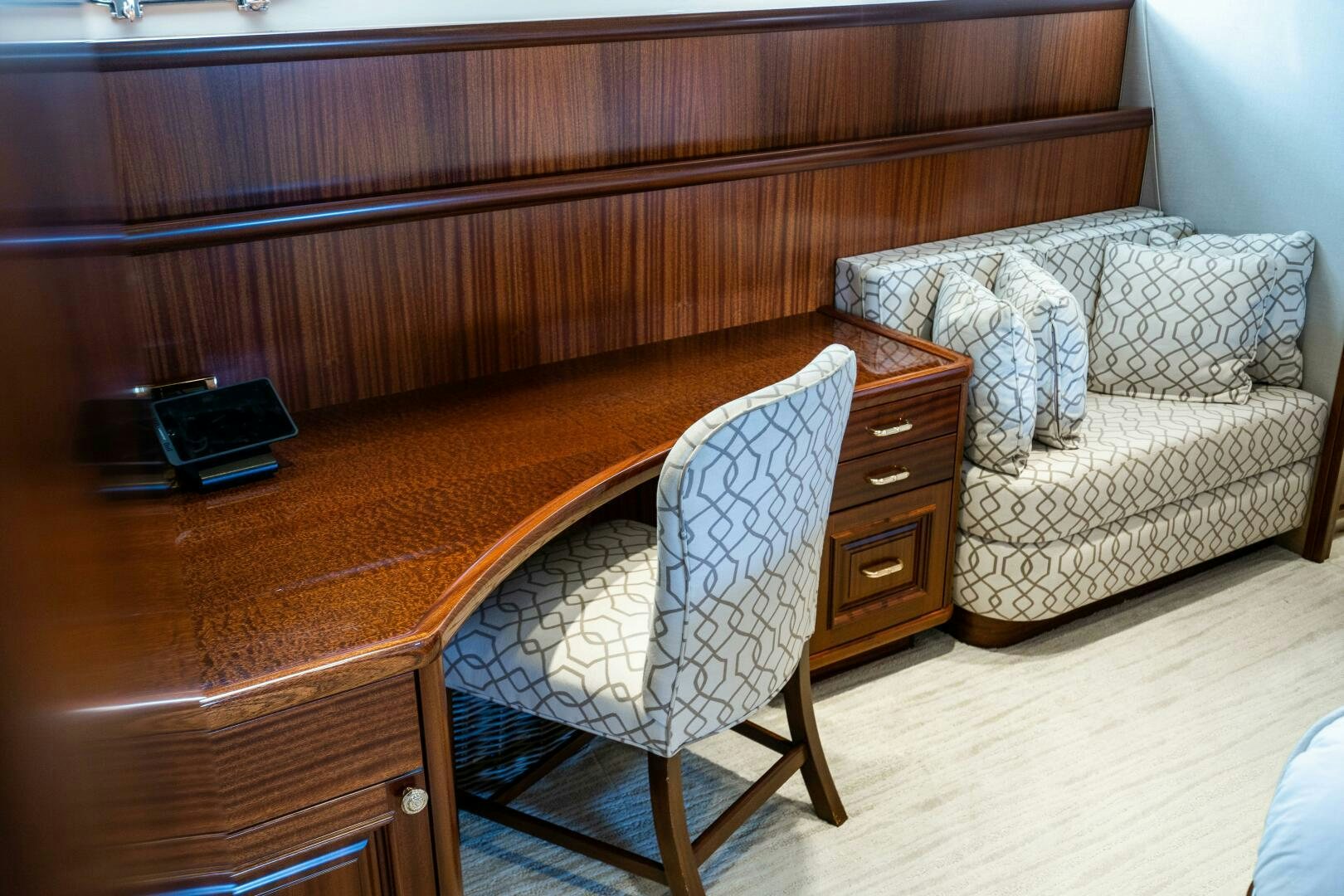 a chair and a couch in a room aboard FIRST LIGHT Yacht for Sale