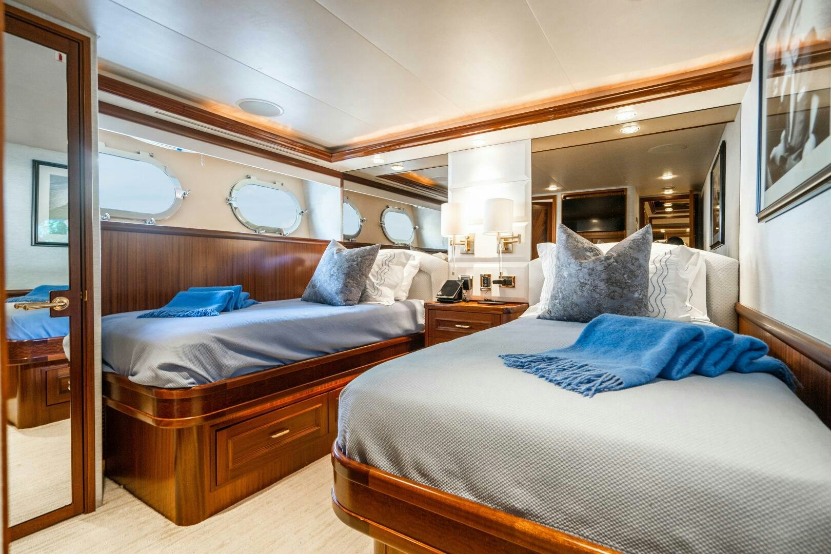 a couple of beds in a hotel room aboard FIRST LIGHT Yacht for Sale