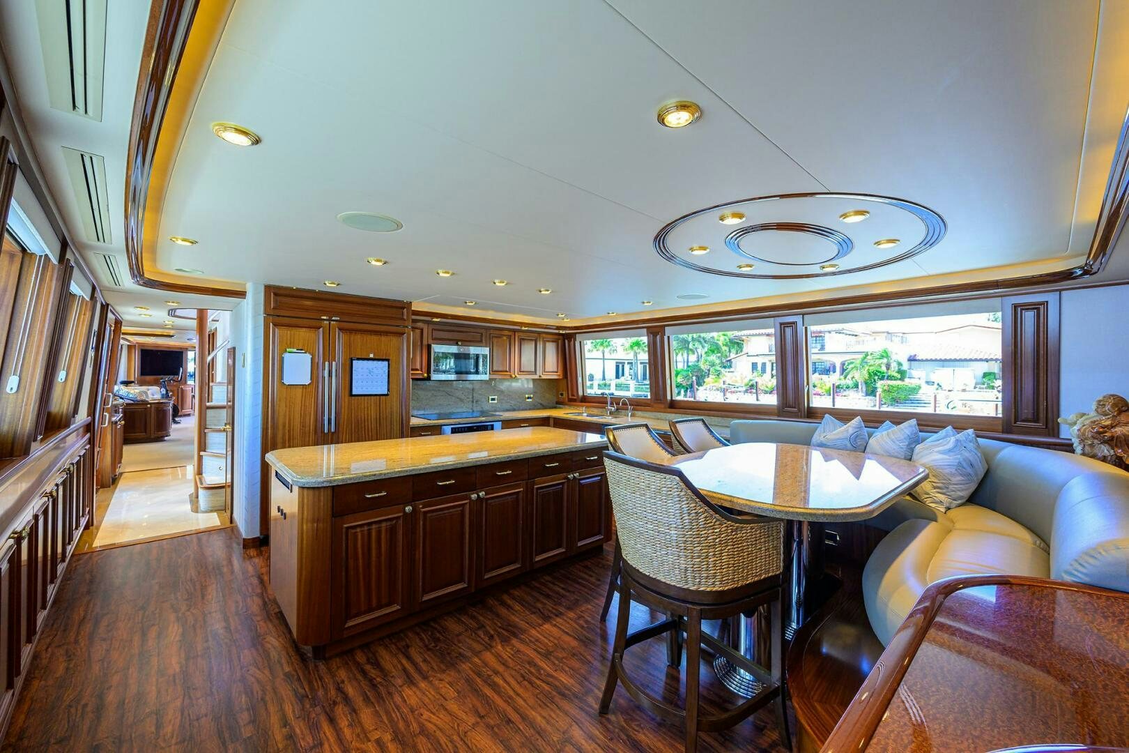 a kitchen and dining area aboard FIRST LIGHT Yacht for Sale