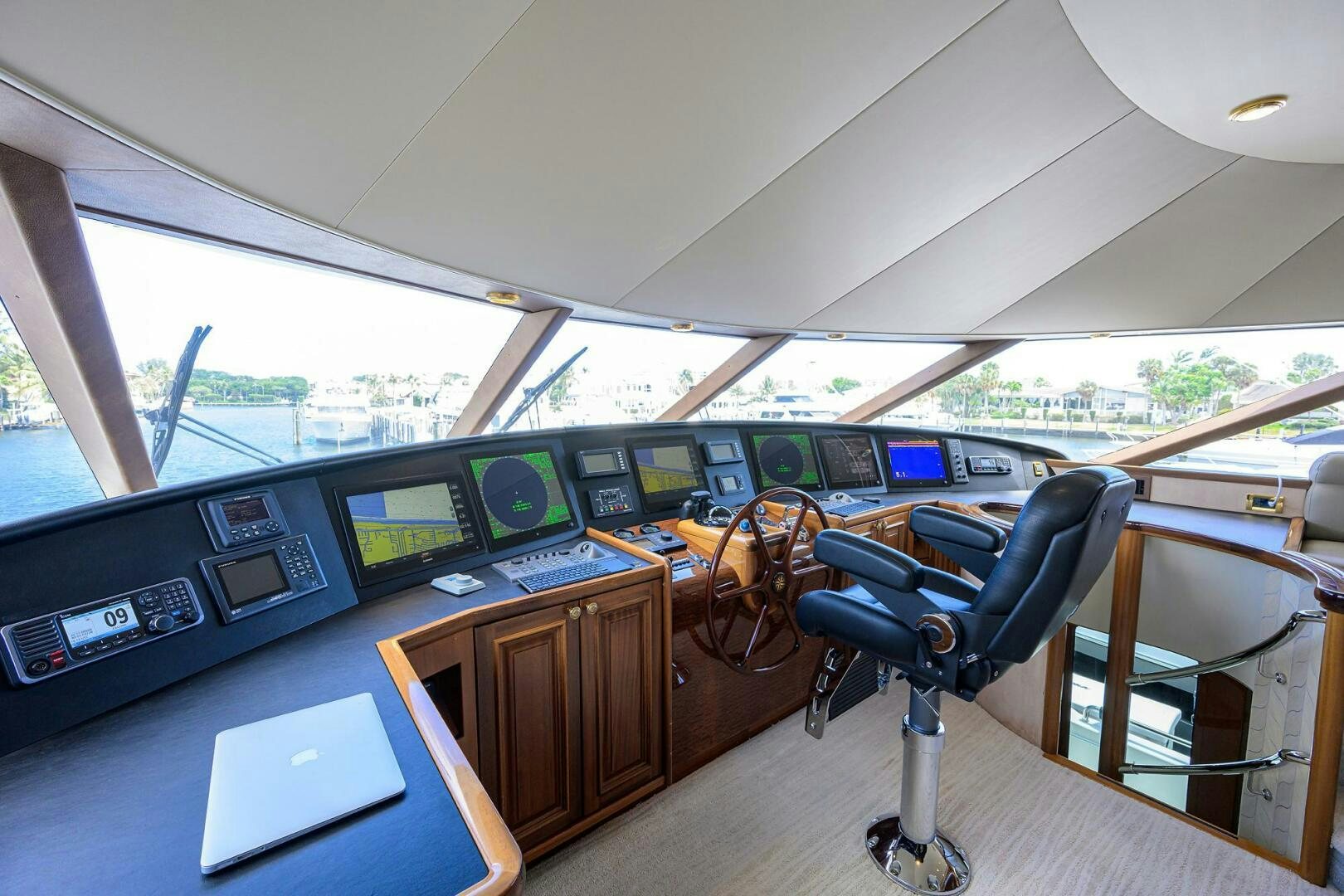 a room with a desk and chairs aboard FIRST LIGHT Yacht for Sale