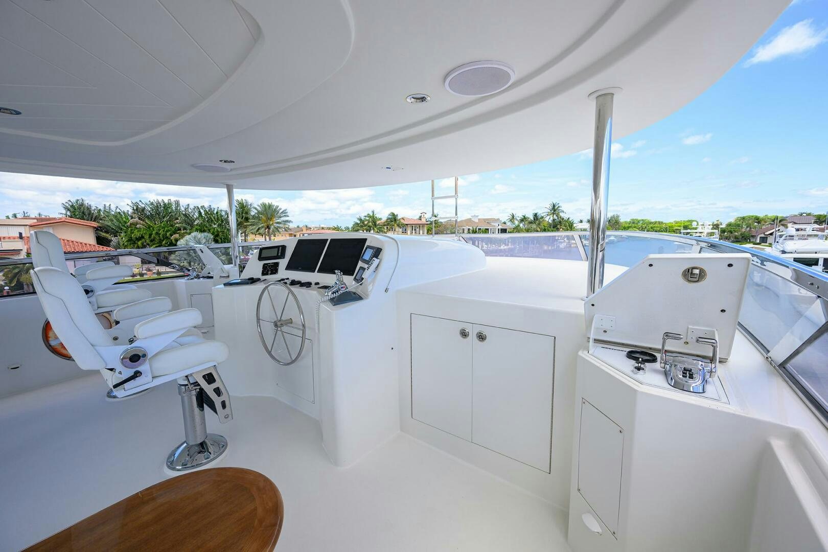 a white car on a road aboard FIRST LIGHT Yacht for Sale
