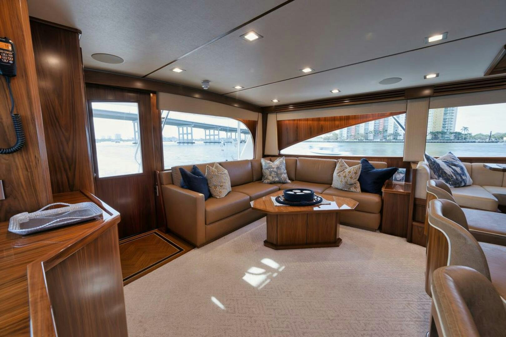 a living room with a couch and a coffee table aboard JO-LI Yacht for Sale