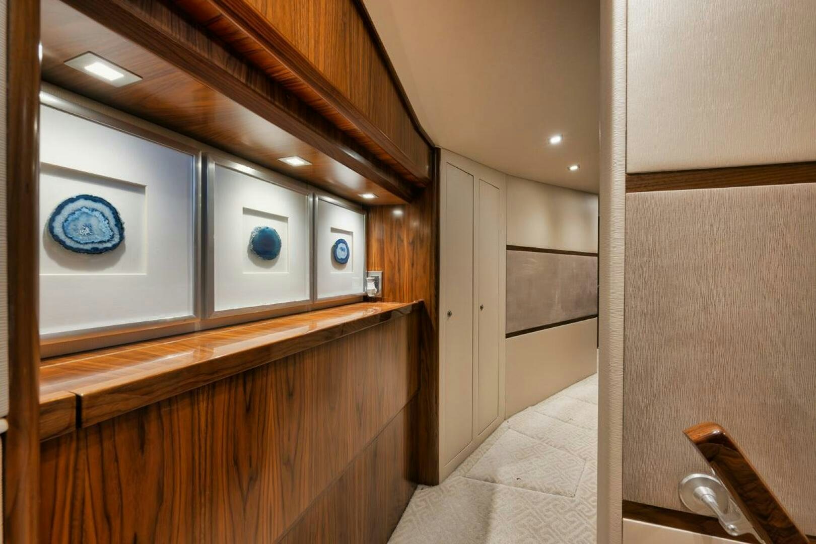 a room with cabinets and a mirror aboard JO-LI Yacht for Sale
