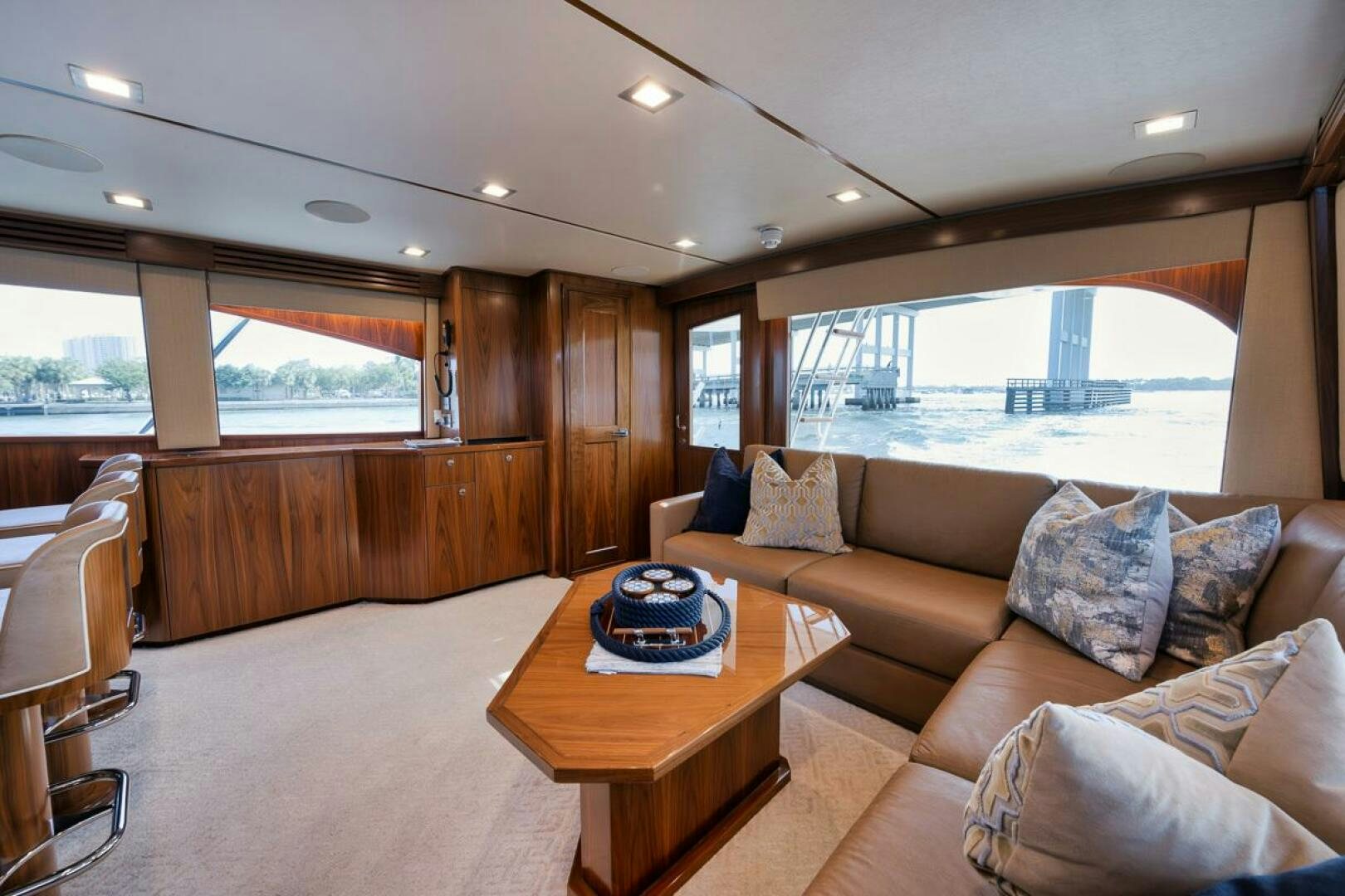 a living room with a large window aboard JO-LI Yacht for Sale