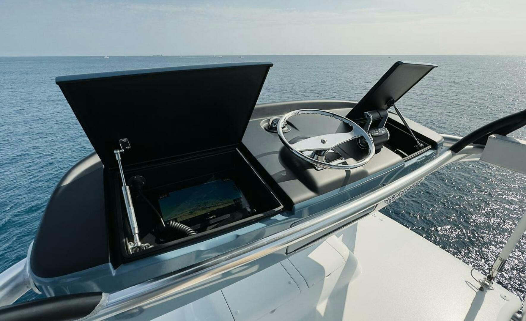 a boat with a steering wheel aboard JO-LI Yacht for Sale